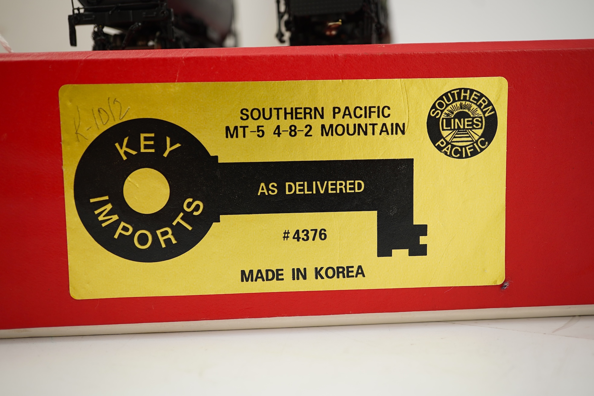 A boxed HO gauge Key Imports model of Southern Pacific Lines MT-5, 4376, 4-8-2 tender locomotive, powered for two rail operation.